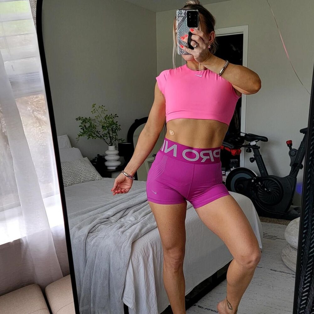 NWT NIKE PRO SCULPT biker shorts in hot fuchsia with reflective silver detailing